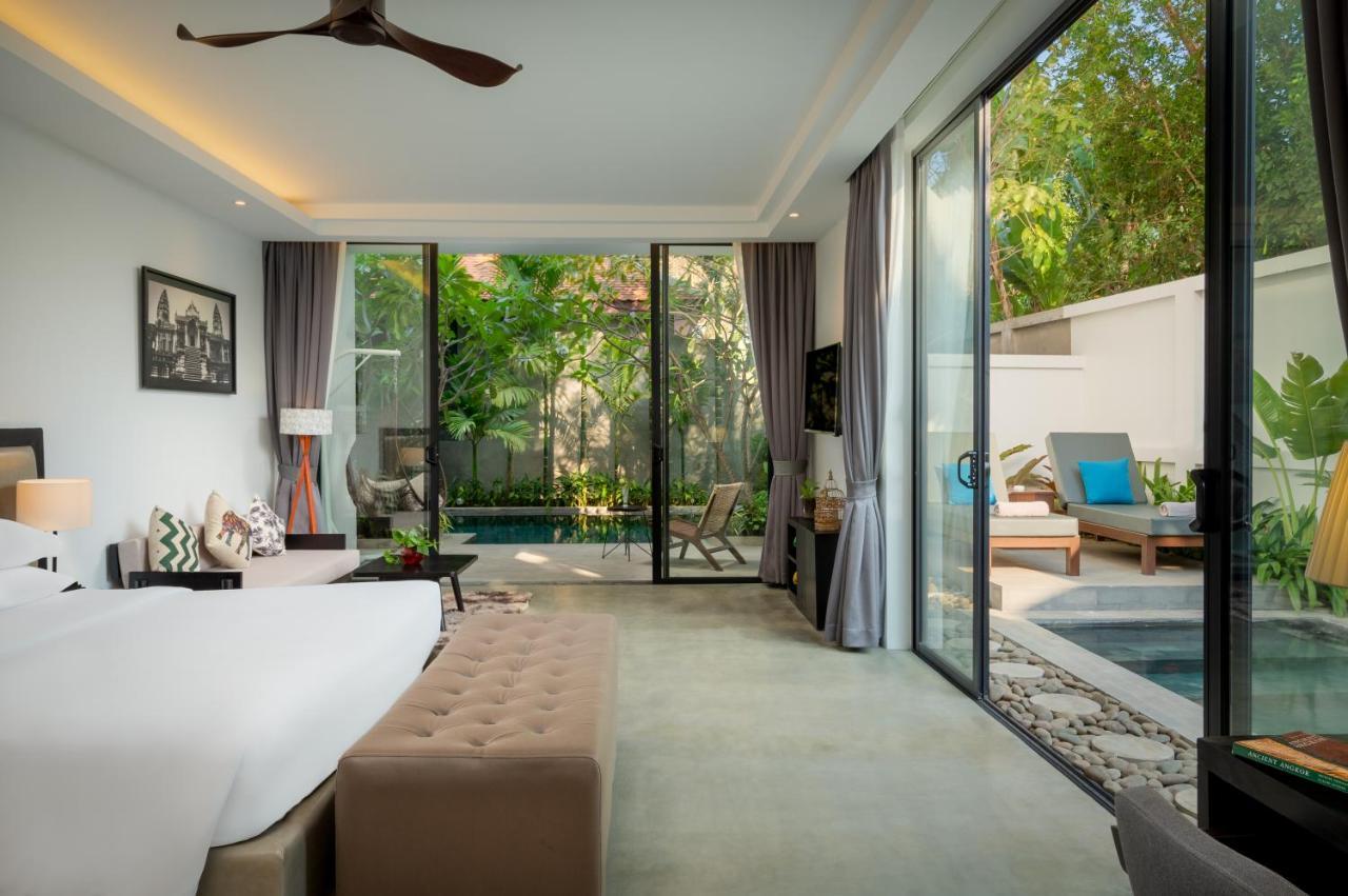 Eightfold Urban Resort Siem Reap Exteriör bild A pool villa at The Village Phuket
