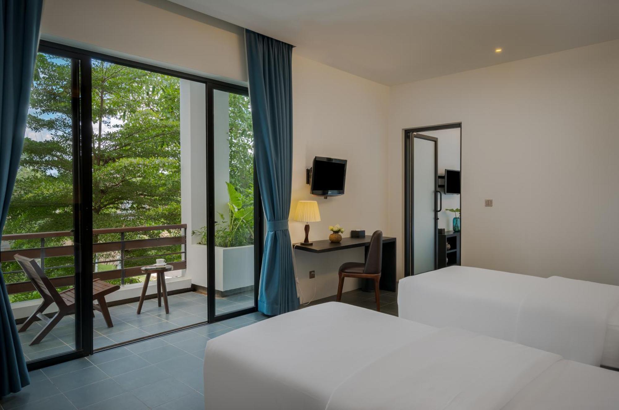 Eightfold Urban Resort Siem Reap Rum bild Deluxe Room